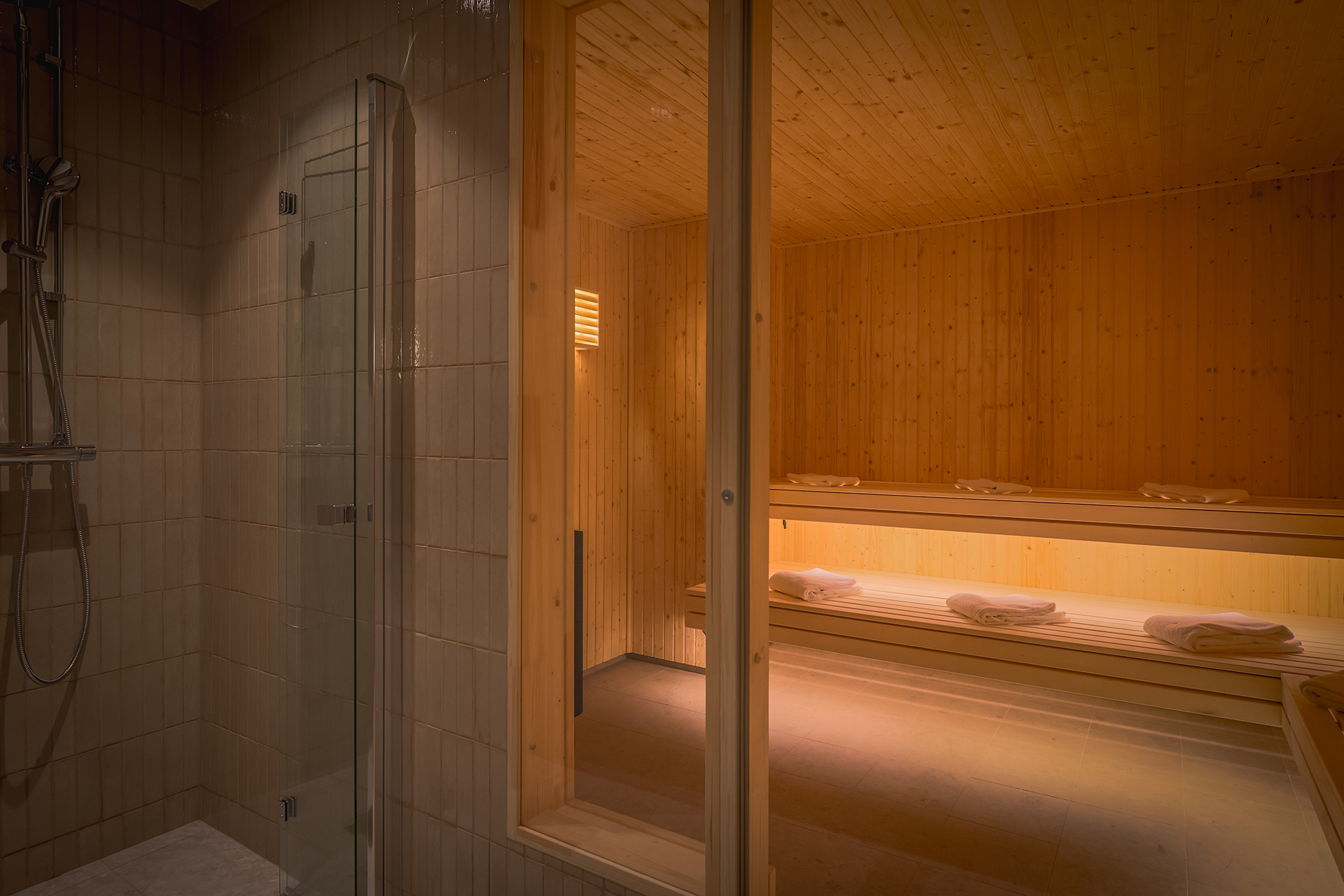 Sauna with towels on the benches